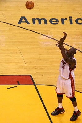 MIAMI - JUNE 15:  Shaquille O'Neal #32 of the Miami Heat shoots a free throw against the Dallas Mavericks in game four of the 2006 NBA Finals on June 15, 2006 at American Airlines Arena in Miami, Florida. The Heat defeated the Mavericks 98-74 to even the