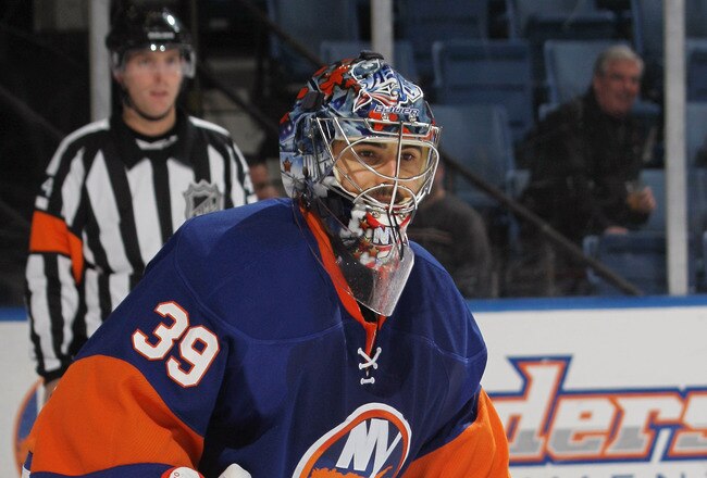 UNIONDALE, NY - NOVEMBER 24:  Rick DiPietro #39 of the New York Islanders skates against the Columbus Blue Jackets at the Nassau Coliseum on November 24, 2010 in Uniondale, New York.  (Photo by Bruce Bennett/Getty Images)