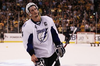 BOSTON, MA - MAY 27:  Vincent Lecavalier #4 of the Tampa Bay Lightning reacts after their 1 to 0 loss to the Boston Bruins in Game Seven of the Eastern Conference Finals during the 2011 NHL Stanley Cup Playoffs at TD Garden on May 27, 2011 in Boston, Mass