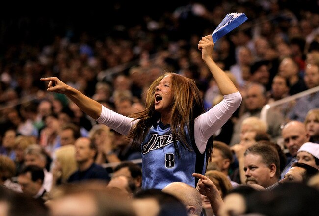 SALT LAKE CITY - APRIL 30:  A Utah Jazz fan cheers for her team during their game against the Denver Nuggets in Game Six of the Western Conference Quarterfinals of the 2010 NBA Playoffs at EnergySolutions Arena on April 30, 2010 in Salt Lake City, Utah. N