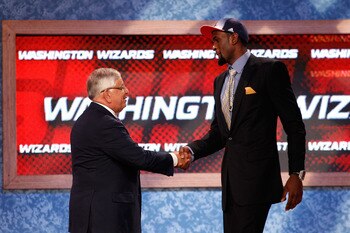 NEWARK, NJ - JUNE 23:  Chris Singleton from Florida State greets NBA Commissioner David Stern  after he was selected #18 overall by the Washington Wizards in the fduring the 2011 NBA Draft at the Prudential Center on June 23, 2011 in Newark, New Jersey.
