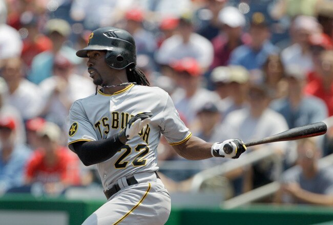 WASHINGTON, DC - JULY 03: Andrew McCutchen #22 of the Pittsburgh Pirates follows his RBI single against the Washington Nationals during the first inning at Nationals Park on July 3, 2011 in Washington, DC.  (Photo by Rob Carr/Getty Images)