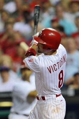 PHILADELPHIA, PA - JUNE 28: Shane Victorino #8 of the Philadelphia Phillies follows through on a two run home-run during the game against the Boston Red Sox at Citizens Bank Park on June 28, 2011 in Philadelphia, Pennsylvania. The Phillies won 5-0. (Photo