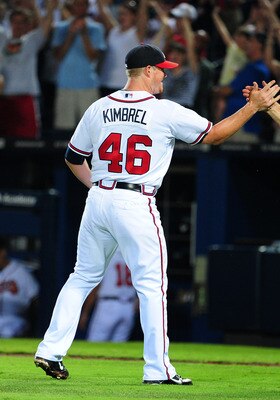 ATLANTA - JULY 2: Craig Kimbrel #46 and David Ross #8 of the Atlanta Braves celebrate after the game against the Baltimore Orioles at Turner Field on July 2, 2011 in Atlanta, Georgia. (Photo by Scott Cunningham/Getty Images)
