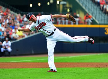 ATLANTA - JULY 2: Chipper Jones #10 of the Atlanta Braves fields a grounder against the Baltimore Orioles at Turner Field on July 2, 2011 in Atlanta, Georgia. (Photo by Scott Cunningham/Getty Images)