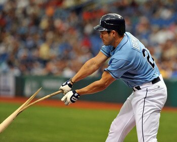 ST. PETERSBURG, FL - JULY 3:  Designated hitter Johnny Damon #22  of the Tampa Bay Rays breaks a bat against the St. Louis Cardinals July 3, 2011 at Tropicana Field in St. Petersburg, Florida.  The Rays won 8 - 3. (Photo by Al Messerschmidt/Getty Images)
