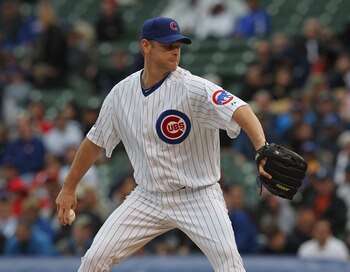 CHICAGO, IL - MAY 06:  Kerry Wood #34 of the Chicago Cubs pitches against the Cincinnati Reds at Wrigley Field on May 6, 2011 in Chicago, Illinois. The Reds defeated the Cubs 5-4.  (Photo by Jonathan Daniel/Getty Images)