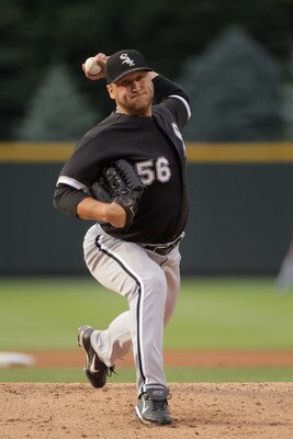 DENVER, CO - JUNE 29:  Starting pitcher Mark Buehrle #56 of the Chicago White Sox delviers against the Colorado Rockies during Interleague play at Coors Field on June 29, 2011 in Denver, Colorado. The White Sox defeated the Rockies 3-2.  (Photo by Doug Pe