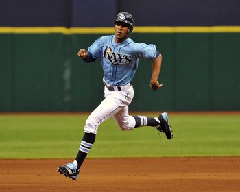 ST. PETERSBURG, FL - JULY 3:  Outfielder B. J. Upton #2 of the Tampa Bay Rays runs to third base against the St. Louis Cardinals July 3, 2011 at Tropicana Field in St. Petersburg, Florida.  (Photo by Al Messerschmidt/Getty Images)