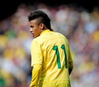 LONDON, ENGLAND - MARCH 27: Neymar of Brazil looks on during the International friendly match between Brazil and Scotland at Emirates Stadium on March 27, 2011 in London, England.  (Photo by Jamie McDonald/Getty Images)