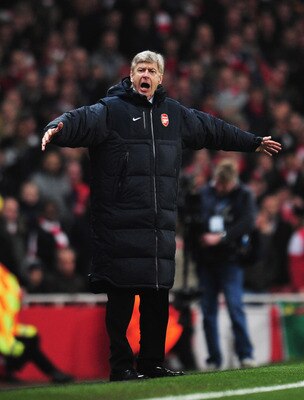 LONDON, ENGLAND - FEBRUARY 16: Arsene Wenger, Manager of Arsenal shows his frustration during the UEFA Champions League round of 16 first leg match between Arsenal and Barcelona at the Emirates Stadium on February 16, 2011 in London, England.  (Photo by S