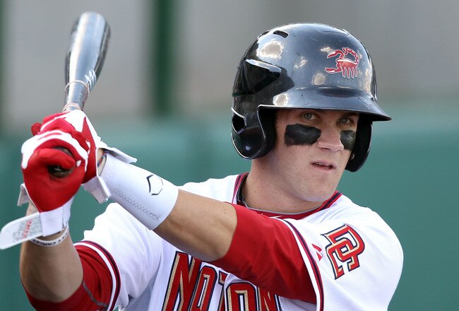 SCOTTSDALE, AZ - OCTOBER 23:  Washington Nationals prospect Bryce Harper #34, playing for the Scottsdale Scorpions, warms up on deck during the AZ Fall League game against the Phoenix Desert Dogs at Scottsdale Stadium on October 23, 2010 in Scottsdale, Ar