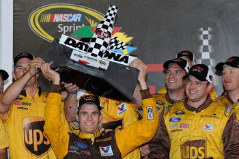 DAYTONA BEACH, FL - JULY 02:  David Ragan, driver of the #6 UPS Ford, celebrates after winning the NASCAR Sprint Cup Series Coke ZERO 400 Powered by Coca-Cola at Daytona International Speedway on July 2, 2011 in Daytona Beach, Florida.  (Photo by Jared C.