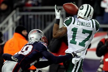 FOXBORO, MA - JANUARY 16:  Braylon Edwards #17 of the New York Jets catches a pass over Darius Butler #28 of the New England Patriots in the second quarter during their 2011 AFC divisional playoff game at Gillette Stadium on January 16, 2011 in Foxboro, M
