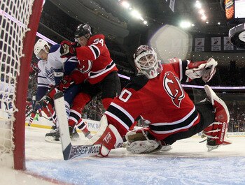 NEWARK, NJ - APRIL 06: Martin Brodeur #30 of the New Jersey Devils makes the second period save against the Toronto Maple Leafs at the Prudential Center on April 6, 2011 in Newark, New Jersey. The Devils defeated the Maple Leafs 4-2. (Photo by Bruce Benne