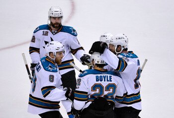 VANCOUVER, CANADA - MAY 24:  (L-R) Joe Pavelski #8, Patrick Marleau #12, Dan Boyle #22  and Joe Thornton #19 of the San Jose Sharks celebrate Marleau's goal in the second period in Game Five of the Western Conference Finals during the 2011 Stanley Cup Pla