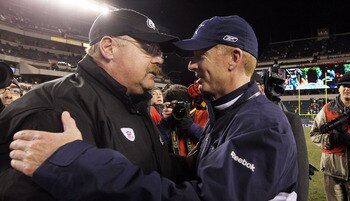 PHILADELPHIA, PA - JANUARY 02: Head coach Andy Reid of the Philadelphia Eagles meets with head coach Jason Garrett of the Dallas Cowboys after their game on January 2, 2011 at Lincoln Financial Field in Philadelphia, Pennsylvania. The Cowboys defeated the