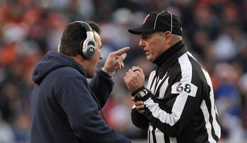 DENVER - DECEMBER 26:  Head coach Gary Kubiak of the Houston Texas has words with line judge Tom Stephan #68 as the Texans' face the Denver Broncos at INVESCO Field at Mile High on December 26, 2010 in Denver, Colorado. The Broncos defeated the Texans 24-