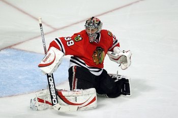 CHICAGO - MAY 07:  Goalie Nikolai Khabibulin #39 of the Chicago Blackhawks tends goal against the Vancouver Canucks during Game Four of the Western Conference Semifinal Round of the 2009 Stanley Cup Playoffs on May 7, 2009 at the United Center in Chicago,