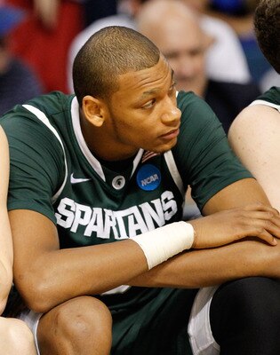 TAMPA, FL - MARCH 17:  (L-R) Austin Thornton #13 and Adreian Payne #5 of the Michigan State Spartans sit on the bench dejected late in the second half of their 78-76 loss against the UCLA Bruins during the second round of the 2011 NCAA men's basketball to