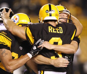 PITTSBURGH - SEPTEMBER 29:  Jeff Reed #3 of the Pittsburgh Steelers celebrates a 23-20 overtime victory over the Baltimore Ravens after his overtime field goal with Mitch Berger #17 on September 29, 2008 at Heinz Field in Pittsburgh, Pennsylvania.  (Photo