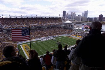 07 Oct 2001:  View from the stands as a fan waves an american flag during the game at Heinz Stadium in Pittsburgh, Pennsylvania. The Steelers won 16-7. DIGITAL IMAGE. Mandatory Credit: Jason Cohn/Allsport