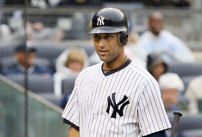 NEW YORK, NY - JUNE 11:  Derek Jeter #2 of the New York Yankees walks back to the dugout after striking out in the ninth inning against the Cleveland Indians on June 11, 2011 at Yankee Stadium in the Bronx borough of New York City.  Jeter finished the day