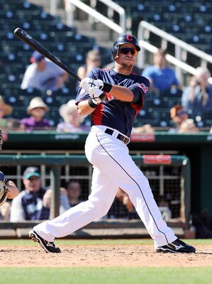 GOODYEAR, AZ - MARCH 11:  Lonnie Chisenhall #76 of the Cleveland Indians follows through on a swing against the Seattle Mariners at Goodyear Ballpark on March 11, 2011 in Goodyear, Arizona.  (Photo by Norm Hall/Getty Images)