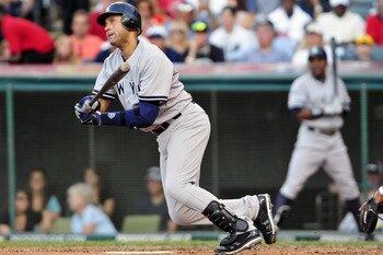 CLEVELAND, OH - JULY 4: Derek Jeter #2 of the New York Yankees hits a ground ball for an out during the sixth inning against the Cleveland Indians at Progressive Field on July 4, 2011 in Cleveland, Ohio. (Photo by Jason Miller/Getty Images)