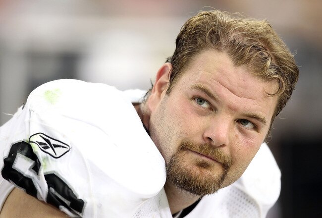 GLENDALE, AZ - SEPTEMBER 26:  Center Cooper Carlisle #66 of the Oakland Raiders sits on the sidelines during the NFL game against the Arizona Cardinals at the University of Phoenix Stadium on September 26, 2010 in Glendale, Arizona.  The Cardinals defeate