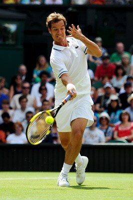 LONDON, ENGLAND - JUNE 27:  Richard Gasquet of France returns a shot during his fourth round match against Andy Murray of Great Britain on Day Seven of the Wimbledon Lawn Tennis Championships at the All England Lawn Tennis and Croquet Club on June 27, 201