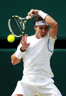 LONDON, ENGLAND - JULY 03:  Rafael Nadal of Spain returns a shot during his final round Gentlemen's match against Novak Djokovic of Serbia on Day Thirteen of the Wimbledon Lawn Tennis Championships at the All England Lawn Tennis and Croquet Club on July 3