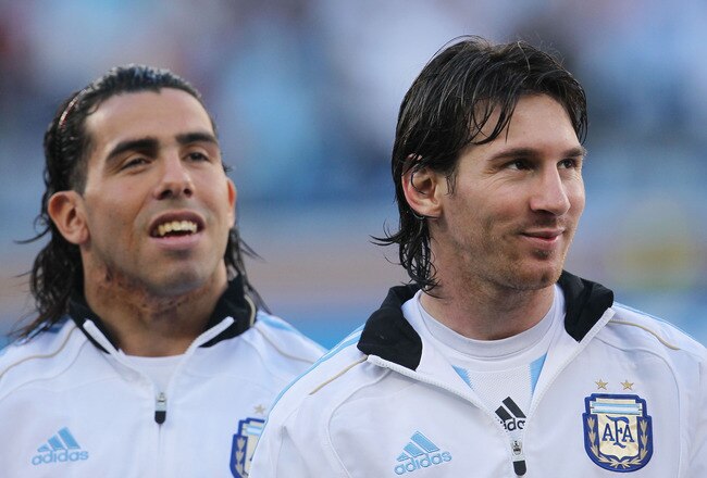CAPE TOWN, SOUTH AFRICA - JULY 03:  Carlos Tevez and Lionel Messi of Argentina ahead of the 2010 FIFA World Cup South Africa Quarter Final match between Argentina and Germany at Green Point Stadium on July 3, 2010 in Cape Town, South Africa.  (Photo by Ch