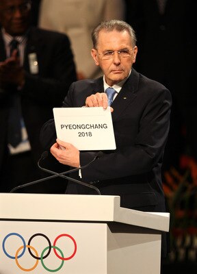 DURBAN, SOUTH AFRICA - JULY 06:  IOC President Jacques Rogge announces PyeongChang as the host city for the 2018 Olympic Winter Games during the 123rd IOC session on July 6, 2011 in Durban, South Africa. The annual general meeting of the members of the In
