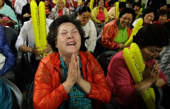 PYEONGCHANG-GUN, SOUTH KOREA - JULY 07:  South Koreans celebrate being selected as 2018 Winter Olympic host city at Alpensia Resort on July 7, 2011 in Pyeongchang, South Korea. Pyeongchang finally won the Winter Olympic host race after being beaten by Van