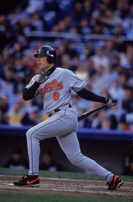 30 Sep 2001:  Cal Ripken Jr #8 of the Baltimore Orioles hits the ball during the game against the New York Yankees at Yankee Stadium in the Bronx, New York.  The Orioles tied the Yankees 1-1 before the game was called due to rainMandatory Credit: Ezra Sha