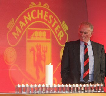 MANCHESTER, ENGLAND - FEBRUARY 6:  (SALES OUT) In this handout image supplied by Manchester United, Harry Gregg of Manchester United speaks during the memorial service to mark the 50th anniversary of the Munich Air Disaster at Old Trafford on February 6 2