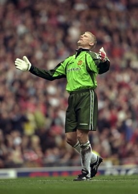16 May 1999:  Peter Schmeichel of Manchester United celebrates winning the title during the FA Carling Premiership match against Tottenham Hotspur played at Old Trafford in Manchester, England.  The match finished in a 2-1 win for Manchester United and th
