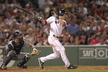 BOSTON, MA  - JUNE 21:  Josh Reddick #16 of the Boston Red Sox knocks in a run against the San Diego Padres at Fenway Park on June 21, 2011 in Boston, Massachusetts.  (Photo by Jim Rogash/Getty Images)