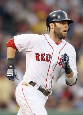 BOSTON, MA - JULY 05:  Dustin Pedroia #15 of the Boston Red Sox rounds first base after his solo home run in the third inning against the Toronto Blue Jays  on July 5, 2011 at Feway Park in Boston, Massachusetts.  (Photo by Elsa/Getty Images)