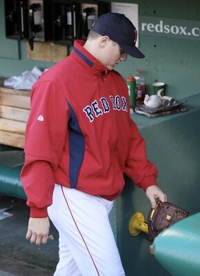 BOSTON - OCTOBER 11:  Jonathan Papelbon #58 of the Boston Red Sox leaves the dugout after losing 7-6 to the Los Angeles Angels of Anaheim in Game Three of the ALDS during the 2009 MLB Playoffs at Fenway Park on October 11, 2009 in Boston,  Massachusetts.