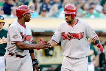 Outfielders Chris Young and Justin Upton have carried Arizona's surprisingly potent offense.
