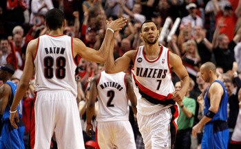 PORTLAND, OR - APRIL 23:  Brandon Roy #7 high fives Nicolas Batum #88 of the Portland Trail Blazers against the Dallas Mavericks in Game Four of the Western Conference Quarterfinals in the 2011 NBA Playoffs on April 23, 2011 at the Rose Garden in Portland