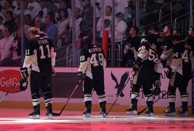 PITTSBURGH, PA - APRIL 27:  The Pittsburgh Penguins stand during the National Anthem before the start of play against the Tampa Bay Lightning in Game Seven of the Eastern Conference Quarterfinals during the 2011 NHL Stanley Cup Playoffs at Consol Energy C