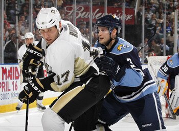 SUNRISE, FL - APRIL 2: Michael Rupp #17 of the Pittsburgh Penguins and Clay Wilson #3 of the Florida Panthers skate into the corner after the puck on April 2, 2011 at the BankAtlantic Center in Sunrise, Florida. (Photo by Joel Auerbach/Getty Images)