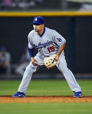 GOODYEAR, AZ - MARCH 03:   Rafael Furcal #15 of the Los Angeles Dodgers gets ready to make a play against the Cincinnati Reds at Goodyear Ballpark on March 3, 2011 in Goodyear, Arizona.  (Photo by Norm Hall/Getty Images)