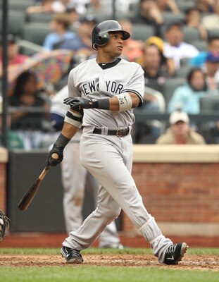 NEW YORK, NY - JULY 03:  Robinson Cano #24 of the New York Yankees  in action against the New York Mets during their game on July 3, 2011 at Citi Field in the Flushing neighborhood of the Queens borough of New York City.  (Photo by Al Bello/Getty Images)