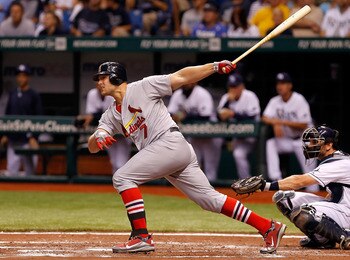 ST. PETERSBURG, FL - JULY 01:  Designated hitter Matt Holliday #7 of the St. Louis Cardinals doubles against the Tampa Bay Rays during the game at Tropicana Field on July 1, 2011 in St. Petersburg, Florida.  (Photo by J. Meric/Getty Images)