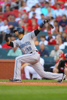 ST. LOUIS, MO - JUNE 24: Jose Bautista #19 of the Toronto Blue Jays hits a double against the St. Louis Cardinals at Busch Stadium on June 24, 2011 in St. Louis, Missouri.  (Photo by Dilip Vishwanat/Getty Images)