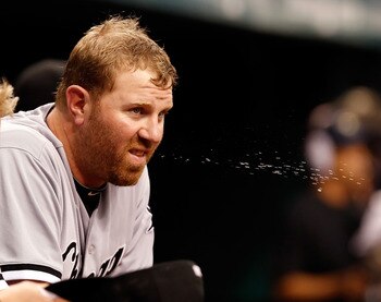 ST. PETERSBURG, FL - APRIL 21:  Designated hitter Adam Dunn #32 of the Chicago White Sox spits against the Tampa Bay Rays during the game at Tropicana Field on April 21, 2011 in St. Petersburg, Florida.  (Photo by J. Meric/Getty Images)